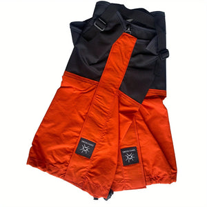 Orange and black gaiters folded flat with under-boot straps