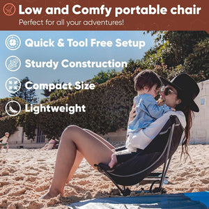 Woman and baby in an ultralight chair on the beach