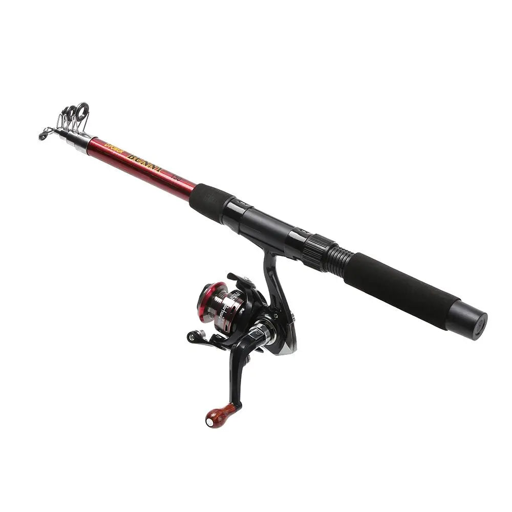 Angler fishing from a rocky jetty with a bent telescopic fiberglass sea fishing rod