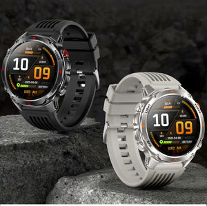 Black-band and grey-band smartwatches with orange digital faces standing on stone