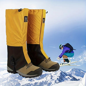 Mustard yellow and black gaiters in front of a skier on a snowy slope