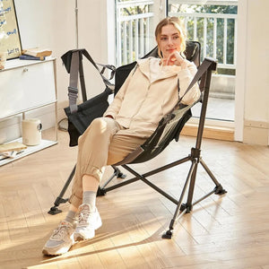 Woman relaxing in the TrailLounge hammock chair indoors