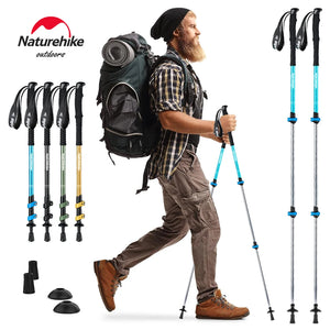 Trekking pole in four colors with a hiker using it, plus spare rubber tips and mud baskets