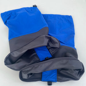 Blue and gray gaiters laid open to show the lining