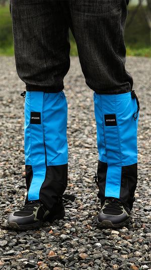 WeatherTrek Lite blue gaiters, front view on gravel