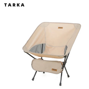 Folding moon camping chair in beige with carry bag