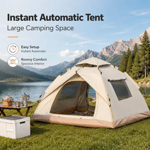 White pop-up tent by a mountain lake with a camp table