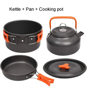 Orange pot with lid, fry pan and kettle