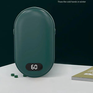 Green pocket hand warmer showing 60 on a dark background