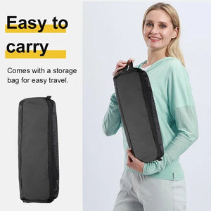 Woman carrying the high back chair in its bag