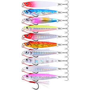 Ten metal jig lures in mixed colors lined up with assist hooks