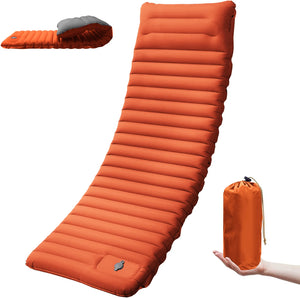 Orange pad with gray pillow and orange stuff sack in hand