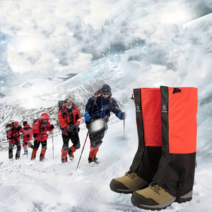 Orange and black snow gaiters on boots, with a group of hikers on a snowy slope