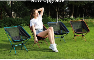 Woman sitting in a mesh moon chair among other chairs