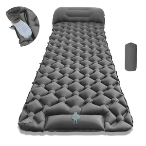 Gray air pad with built-in pillow, foot pump close-up and stuff sack