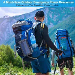 Hiker with a TrailCell solar power bank clipped to the outside of a blue backpack