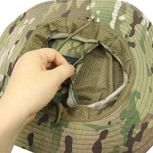 Hand reaching into the hidden pocket inside the boonie hat crown