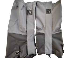 Gray and black gaiters laid flat side by side