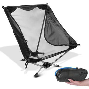 Ultralight backpacking chair with stuff sack in hand