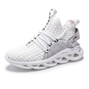White knit-style TrailHawk shoe with a black print on the tongue tab and a wavy sole