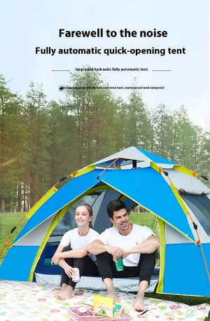 Couple sitting in a blue automatic pop-up tent at a campsite