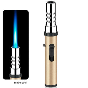 Matte gold pen torch lighter with chrome tip, next to an inset of its blue jet flame