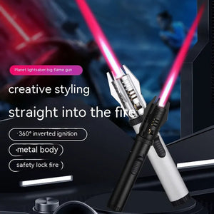 Black and silver jet torch lighters lit with pink-red flames, crossed in front of a movie-style scene