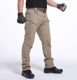 Khaki cargo pants worn with a belt and black boots, side view showing a thigh pocket