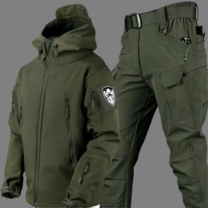 TrailShell hooded jacket in army green with chest and arm zip pockets, shown with green cargo pants
