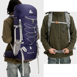 Person wearing the 75L hiking backpack, with the chest strap and hip belt clipped in front
