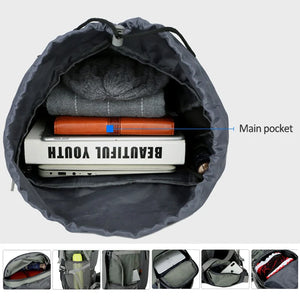 Main room of the 75L backpack packed with clothes and books, with small photos of the other pockets