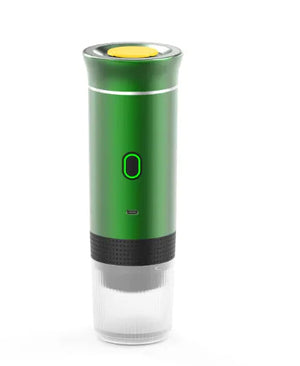 Green NomadBarista portable espresso maker with a green power light and clear cup on the bottom