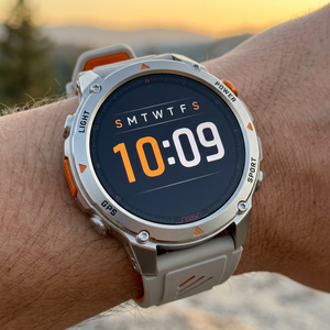 SummitNav rugged smartwatch with light gray and orange silicone band on a man's wrist, Grey Orange color
