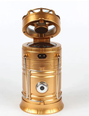Gold EverGlow lantern with the fan flipped up, front view